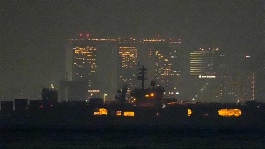 USS Abraham Lincoln sails past Singapore on its way home from Middle East